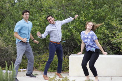 Digital Proteomics executive team jumping into the air