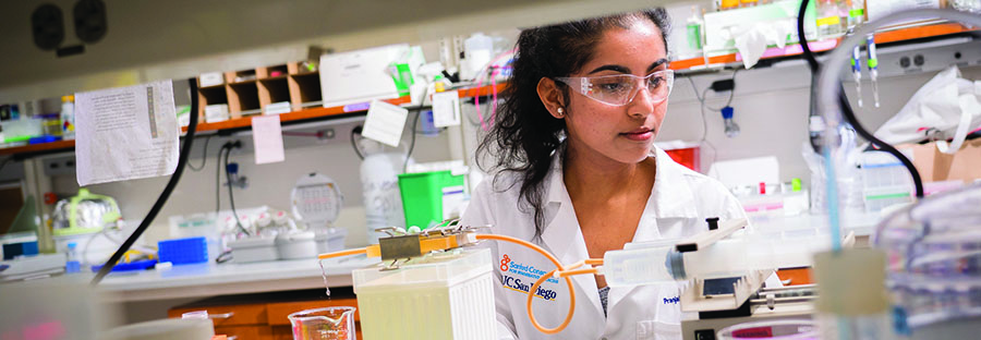 UCSD researcher working in a lab